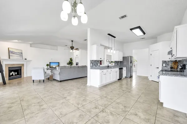 a view of livingroom with furniture and wooden floor