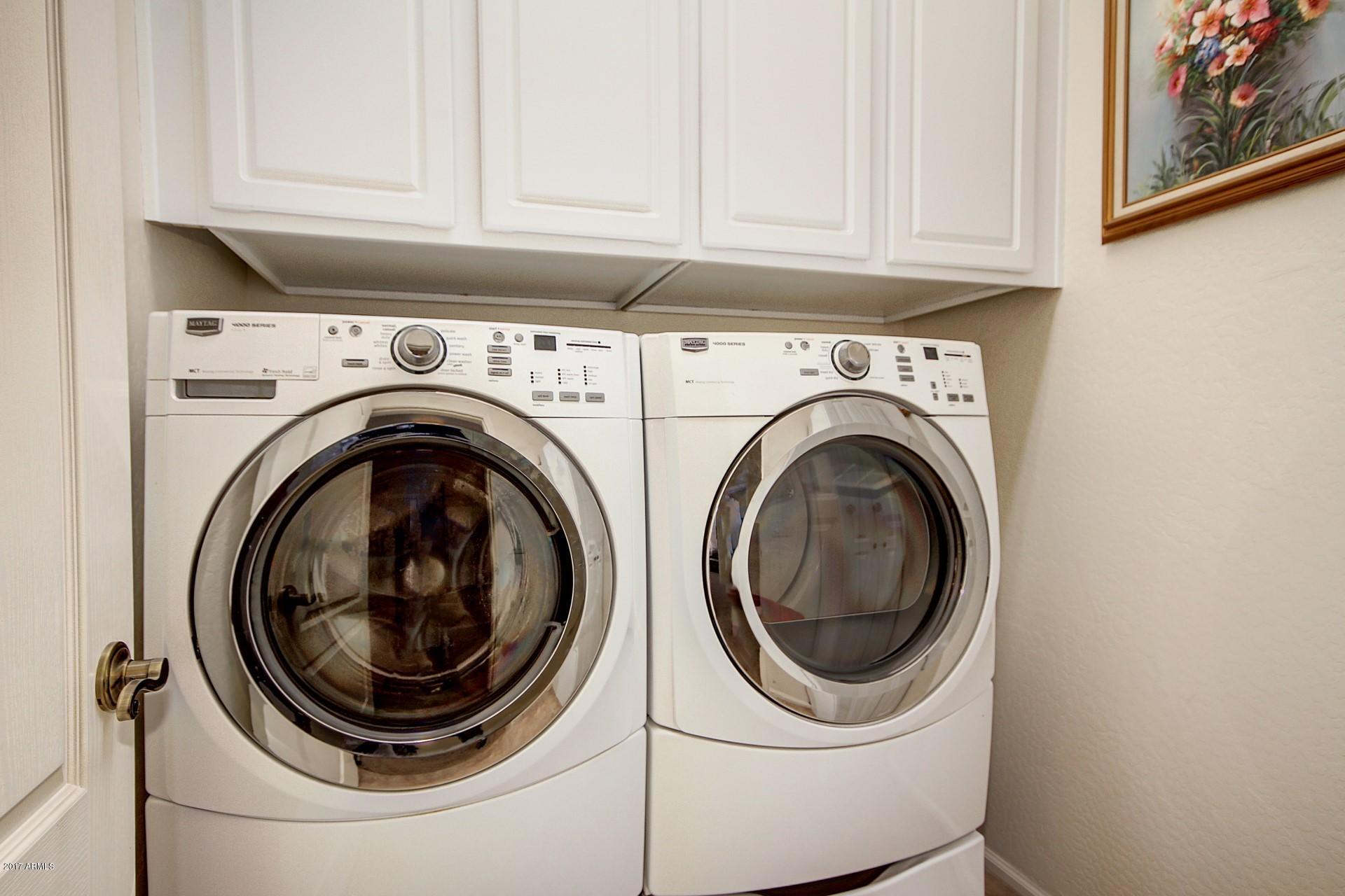 17605 West Bloomfield Road Surprise, AZ 85388 - Photo 12 of 36 LAUNDRY ROOM WITH ABUNDANT CABINETS