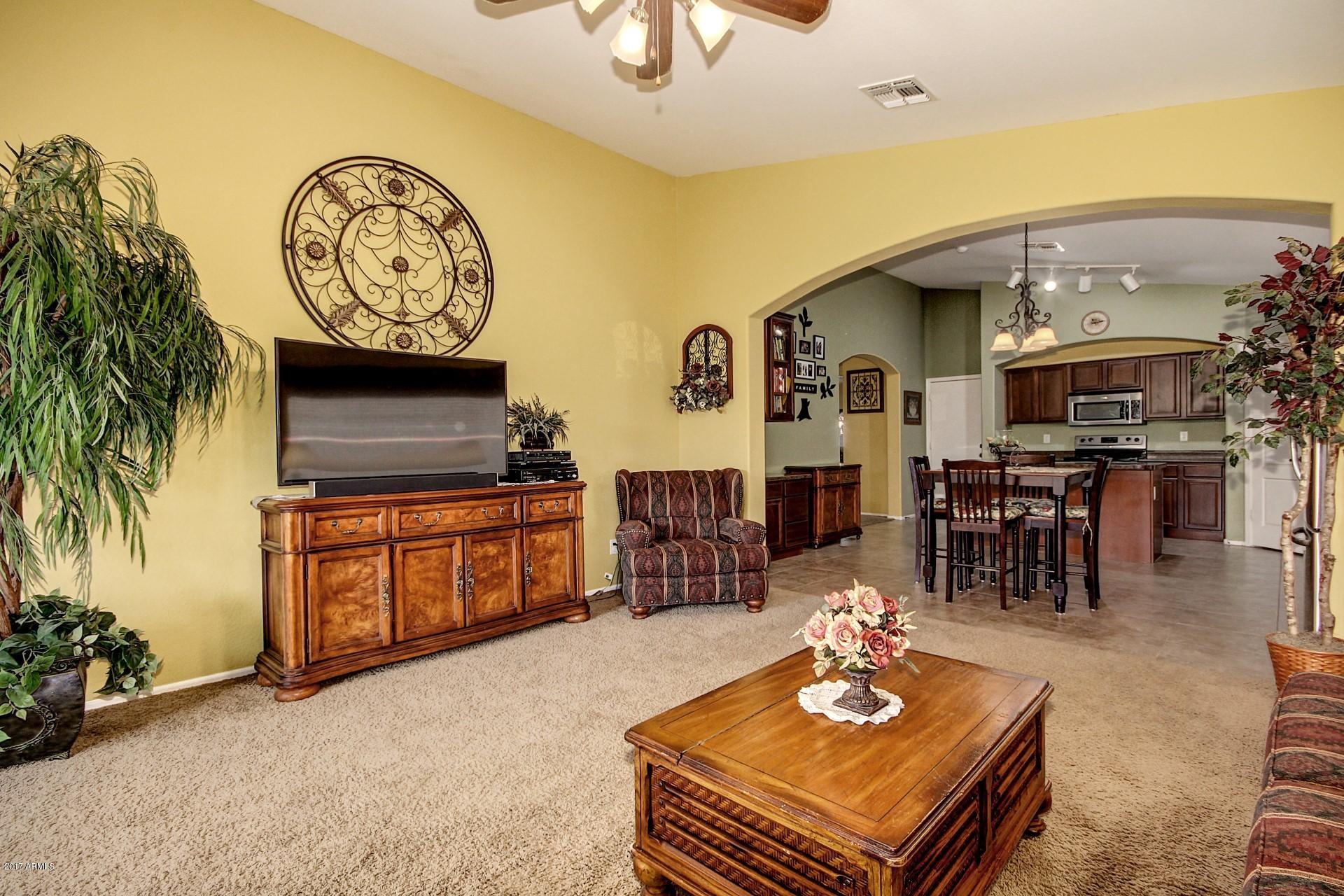 17605 West Bloomfield Road Surprise, AZ 85388 - Photo 13 of 36 LIGHT AND BRIGHT FAMILY ROOM