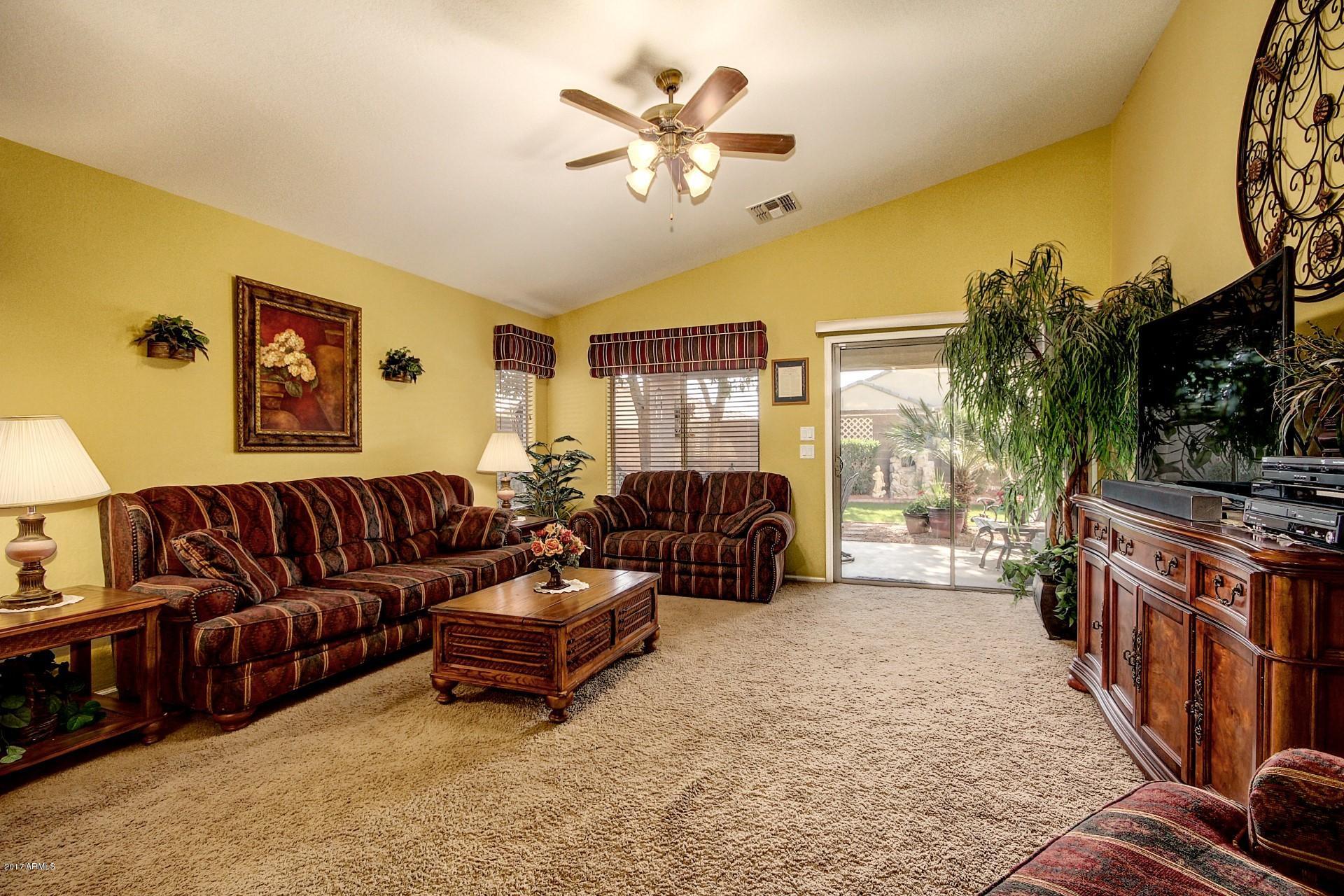 17605 West Bloomfield Road Surprise, AZ 85388 - Photo 28 of 36 FAMILY ROOM WITH BACKYARD ACCESS