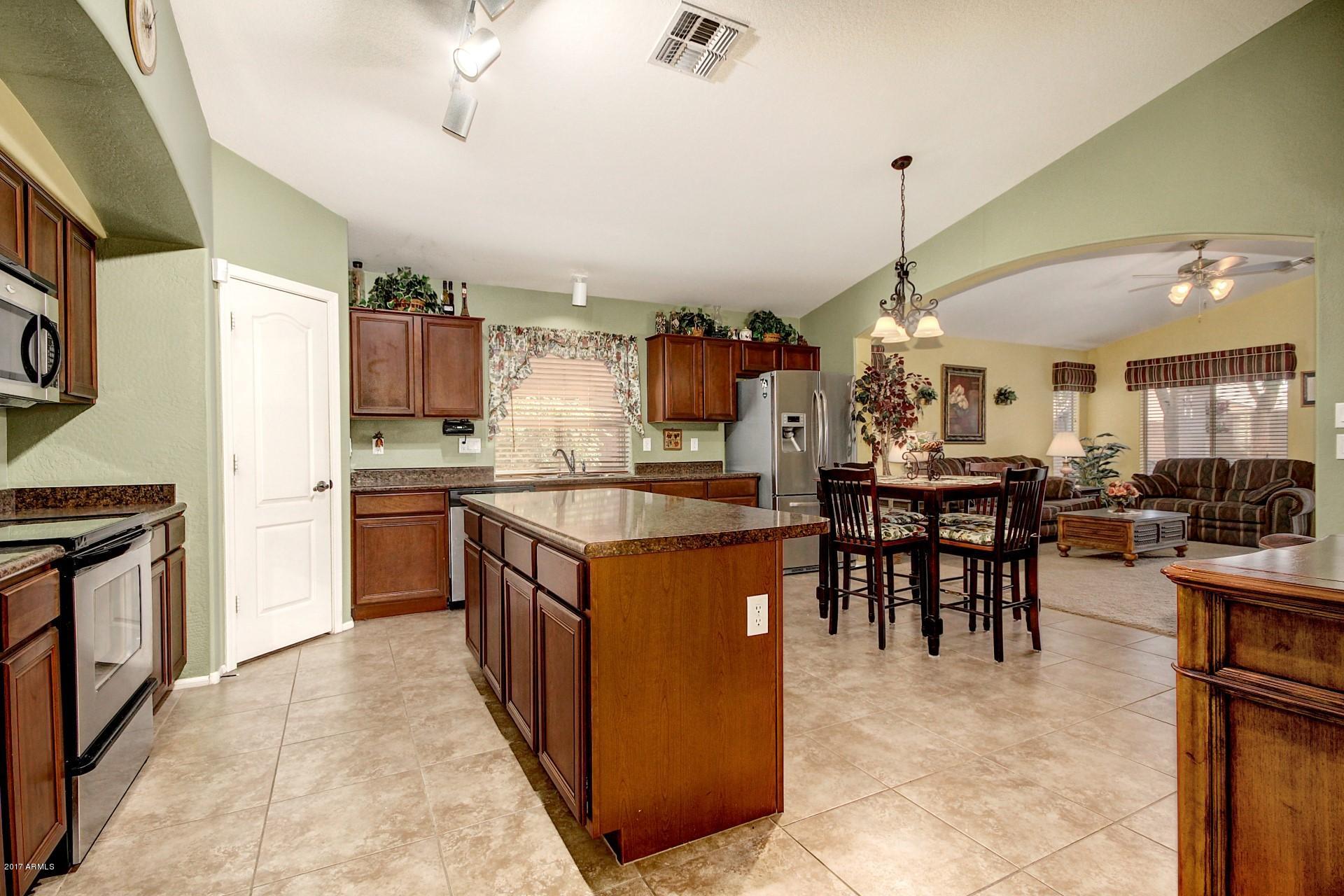 17605 West Bloomfield Road Surprise, AZ 85388 - Photo 4 of 36 COME AND PREPARE IN GOURMET KITCHEN