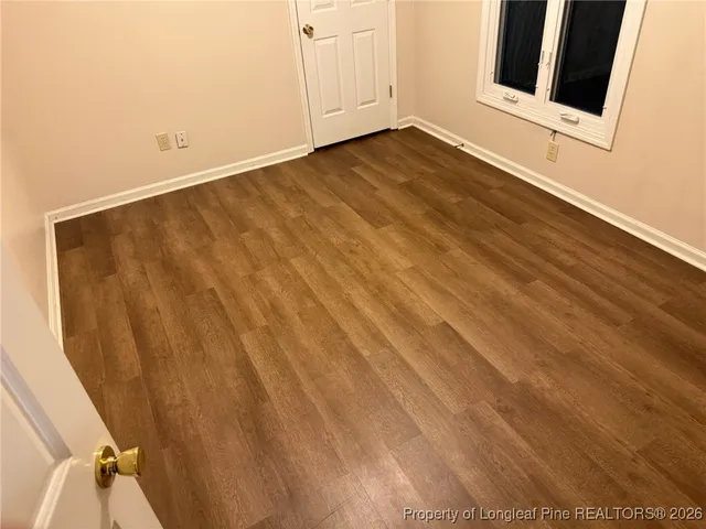 a view of a lake with a garden