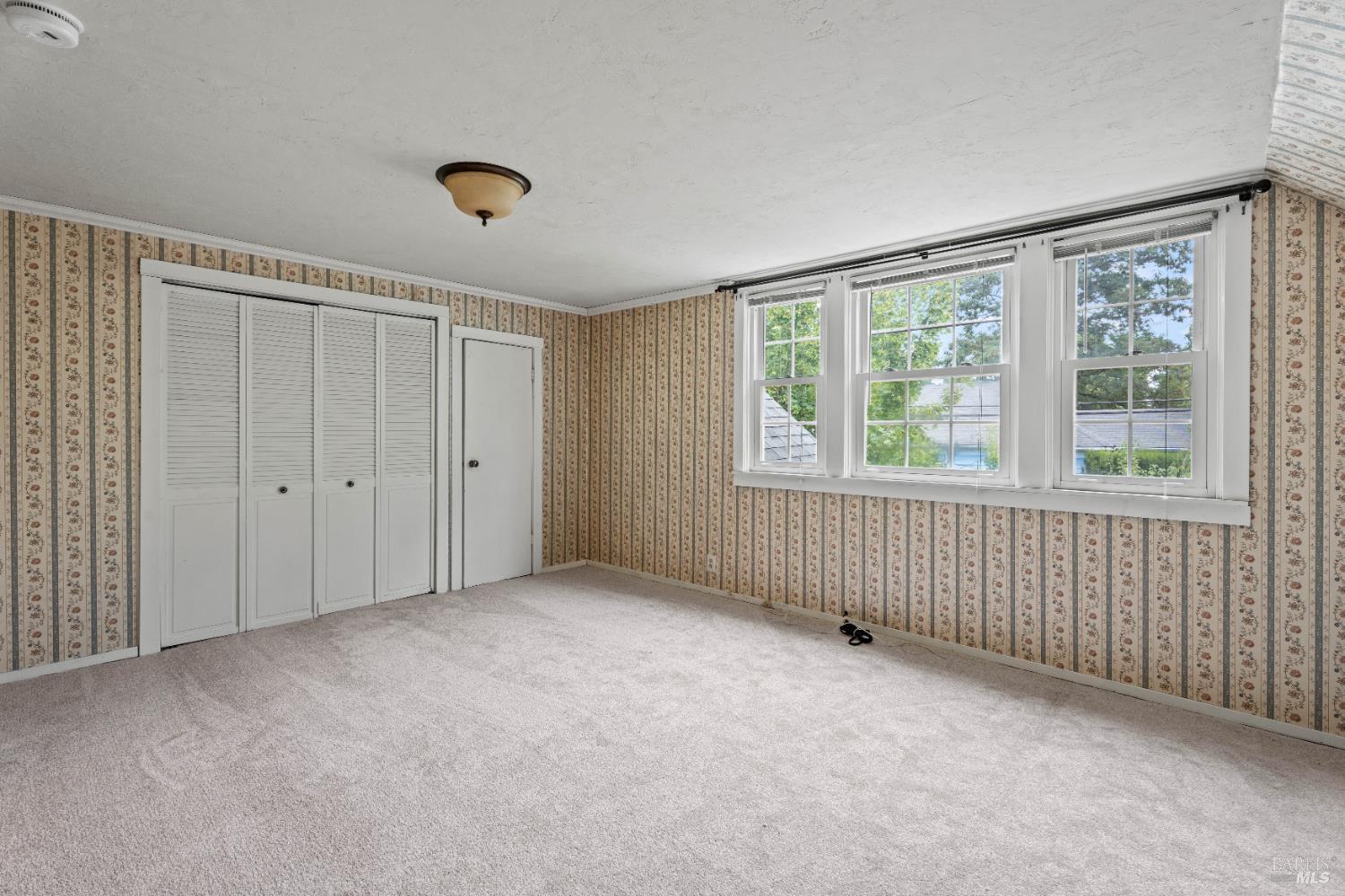 84 School Street Willits, CA 95490 - Photo 19 of 37 a view of an empty room with a window