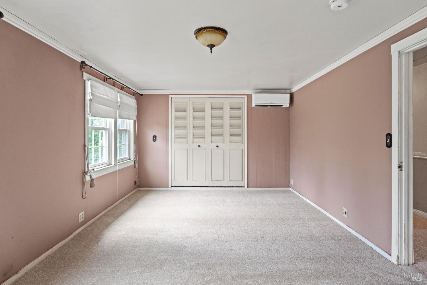 84 School Street Willits, CA 95490 - Photo 20 of 37 a view of an empty room with window and closet area