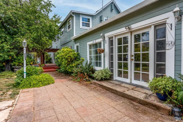 a house view with a garden space