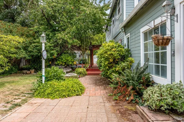 a view of a pathway with a house