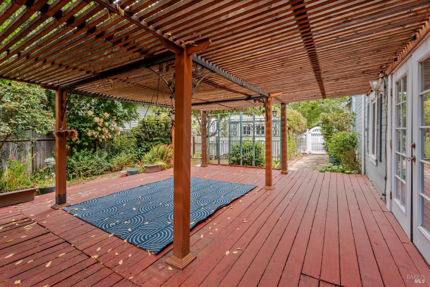 84 School Street Willits, CA 95490 - Photo 30 of 37 a porch with wooden floor in front of a house