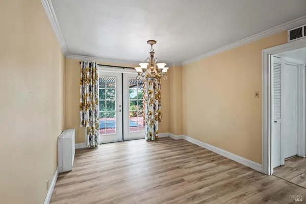 a view of livingroom with hardwood floor and window