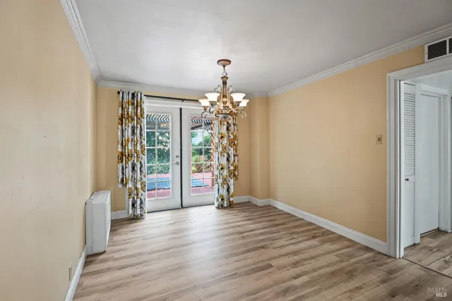 a view of livingroom with hardwood floor and window