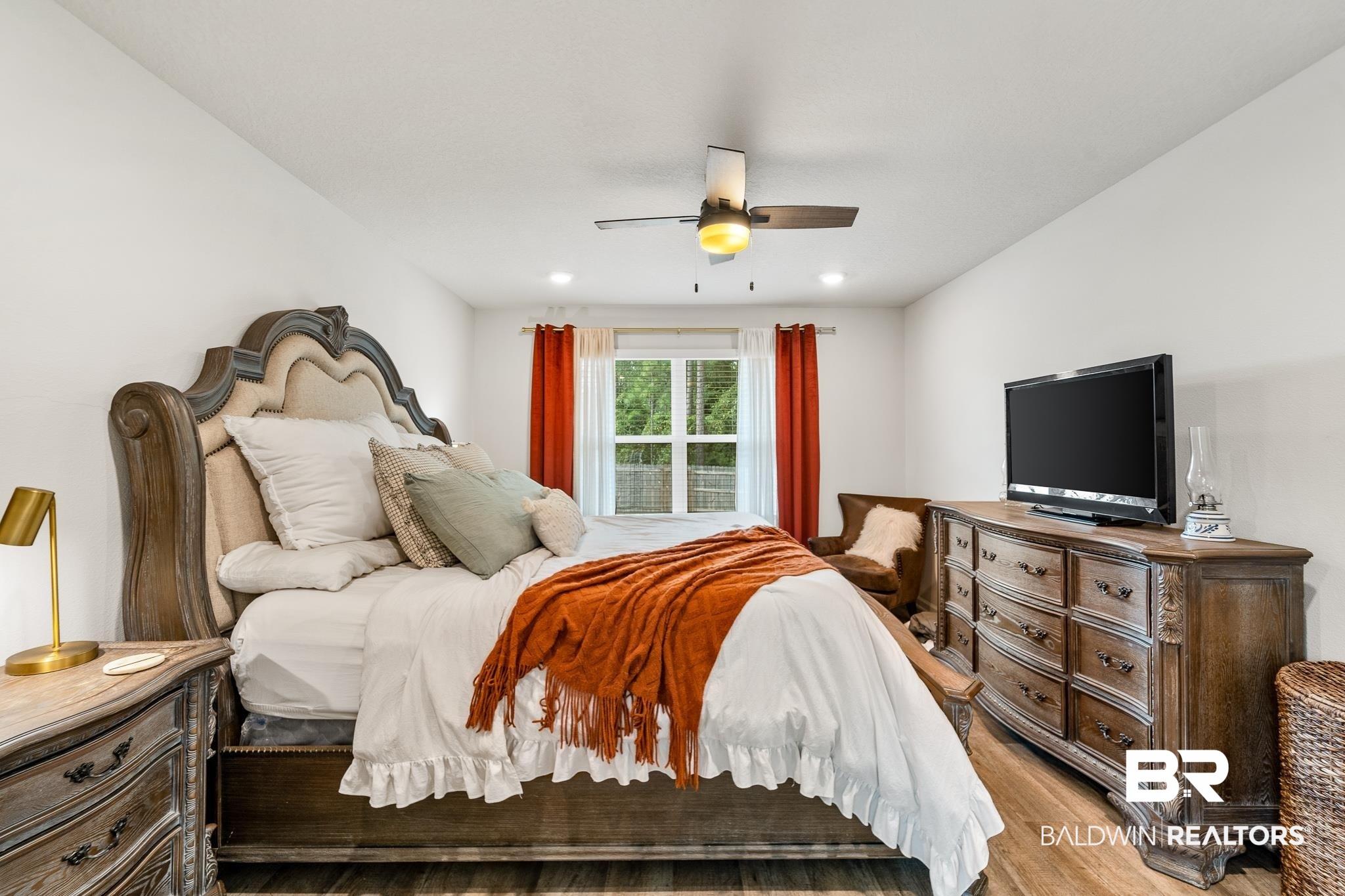 10516 Brodick Loop Daphne, AL 36527 - Photo 14 of 27 Bedroom featuring light wood-type flooring and ceiling fan