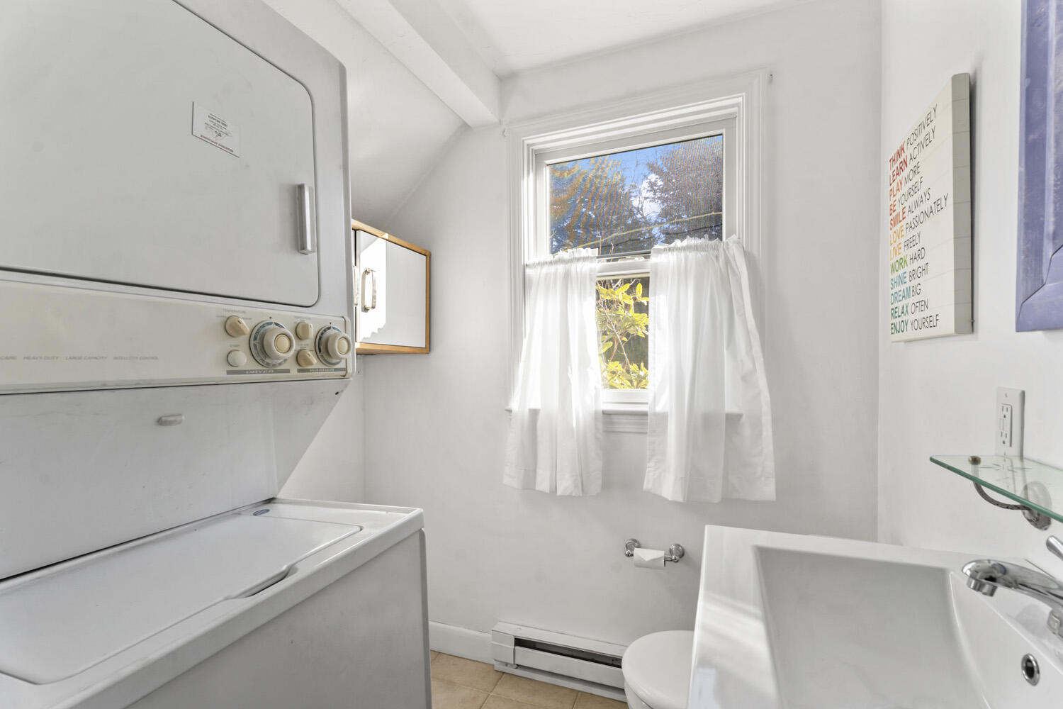 60 Saddle Club Road Edgartown, MA 02539 - Photo 11 of 20 a bathroom with a sink a toilet and a mirror