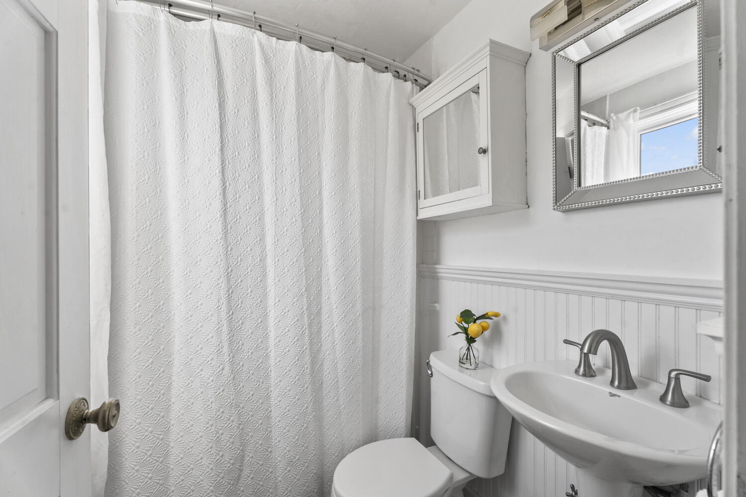 60 Saddle Club Road Edgartown, MA 02539 - Photo 16 of 20 a bathroom with 2 sink toilet and a mirror