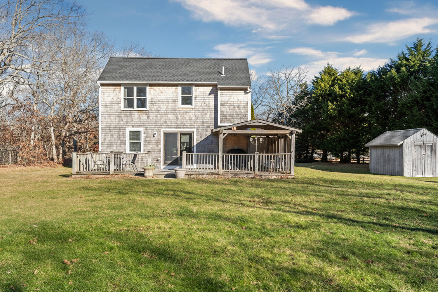 60 Saddle Club Road Edgartown, MA 02539 - Photo 20 of 20 a front view of a house with a yard