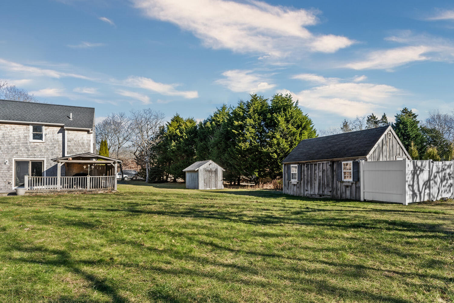60 Saddle Club Road Edgartown, MA 02539 - Photo 3 of 20 a house view with swimming pool in front of it