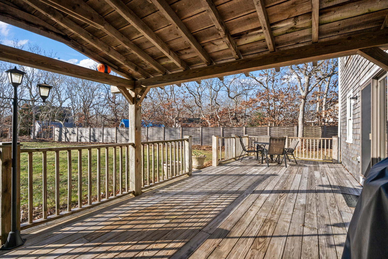 60 Saddle Club Road Edgartown, MA 02539 - Photo 5 of 20 a view of porch with deck and outdoor space
