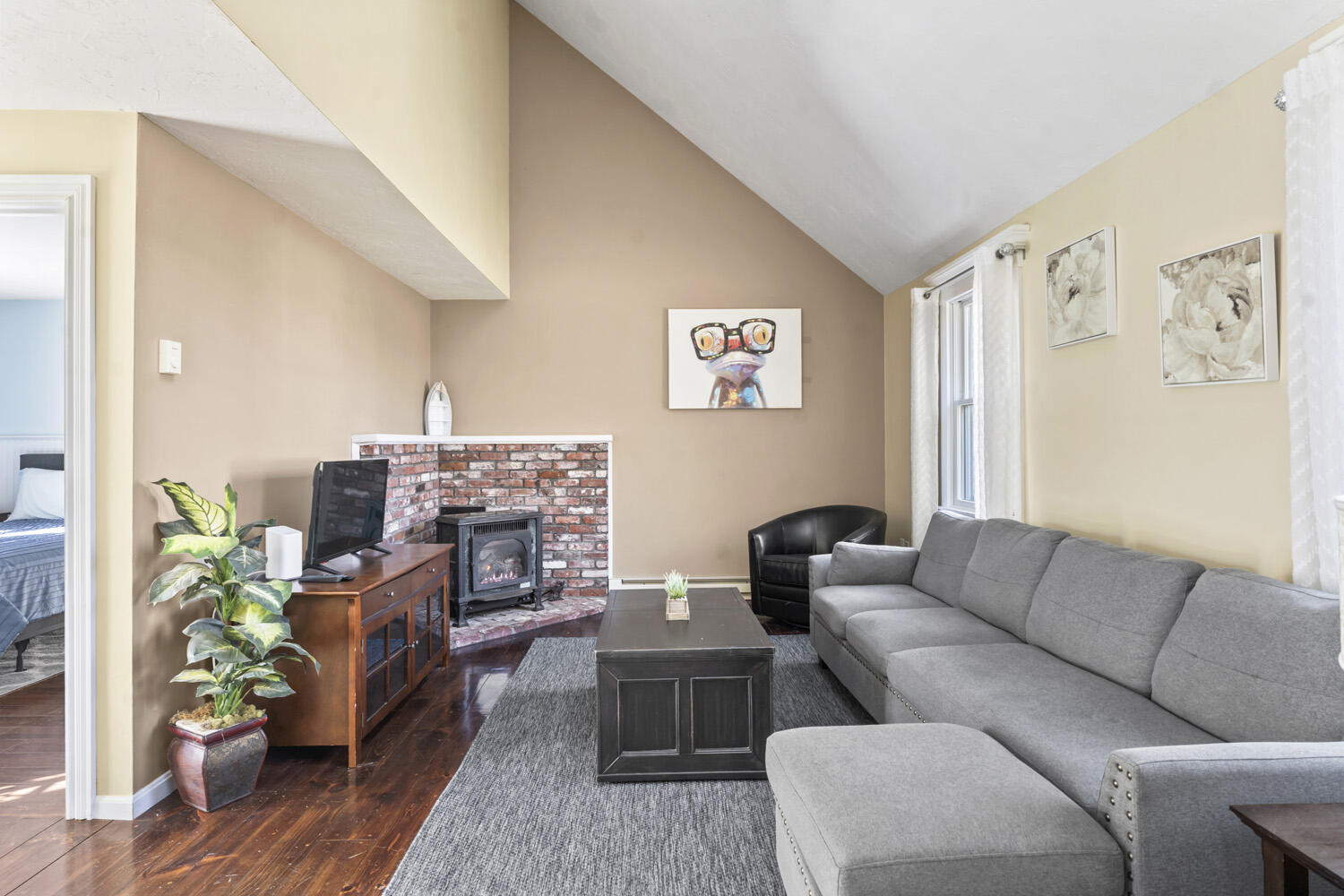 60 Saddle Club Road Edgartown, MA 02539 - Photo 8 of 20 a living room with furniture a fireplace and a table