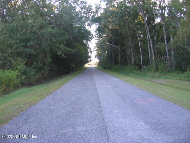 0 Owens Road Jacksonville, FL 32218 - Photo 6 of 20 a view of a yard with a trees