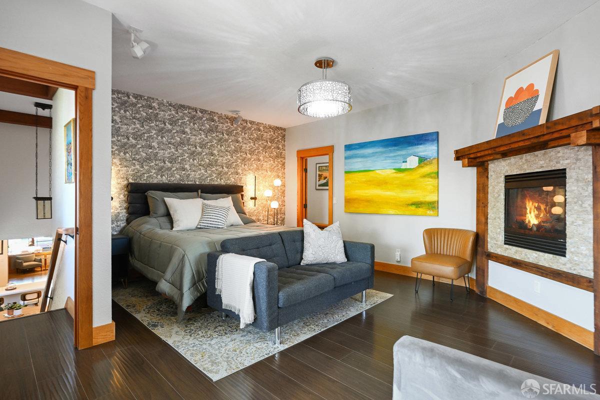 2445 Encinal Avenue Alameda, CA 94501 - Photo 28 of 78 a bedroom with furniture and a fireplace