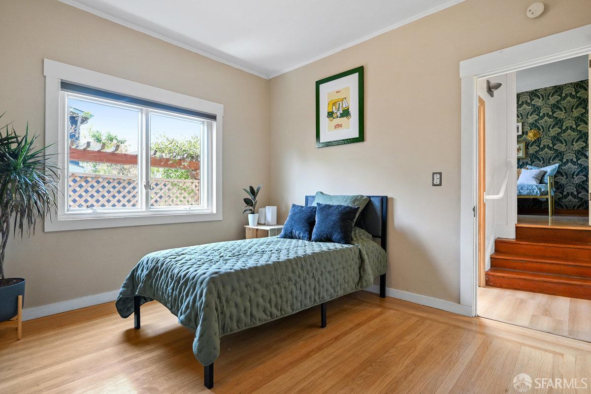 2445 Encinal Avenue Alameda, CA 94501 - Photo 44 of 78 a bedroom with a bed and window
