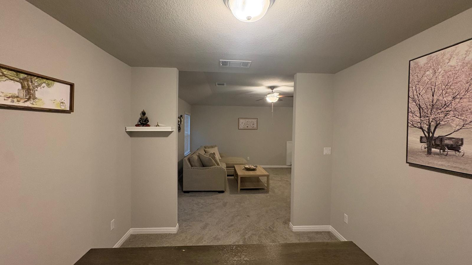 6511 Dragride Road Buda, TX 78610 - Photo 26 of 36 A well-lit interior reveals a comfortable living area, ready for relaxation.