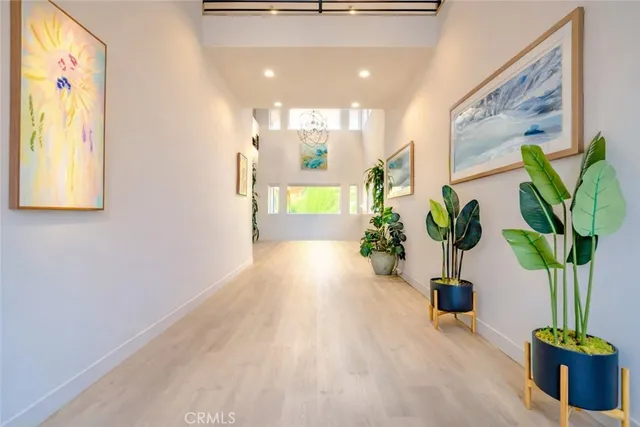 a view of entryway with wooden floor