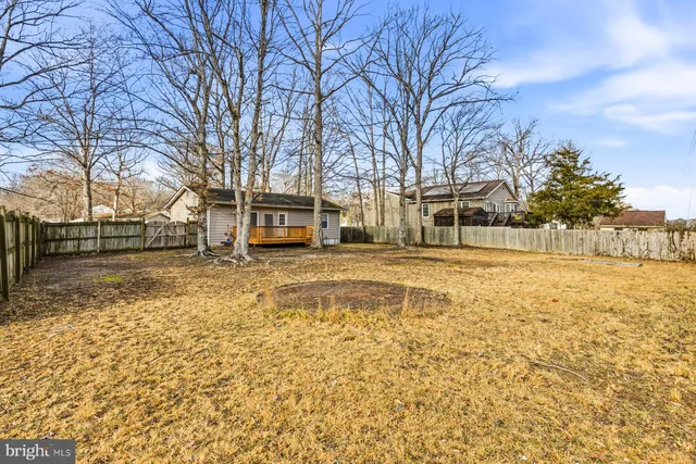 a house with trees in front of it