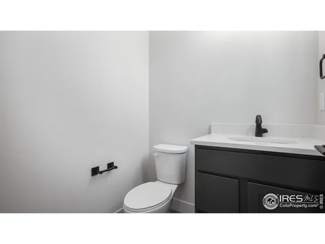 a living room with a ceiling fan