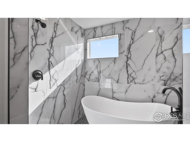 a open living room with a wooden floor