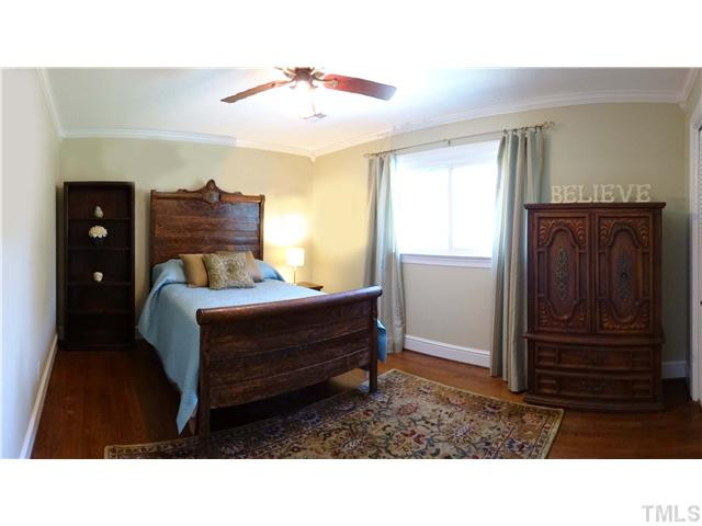 413 Kenwood Court Raleigh, NC 27609 - Photo 14 of 19 This bedroom looks out onto the backyard. The light from the widow is gorgeous and shows off the beauty of the hardwood floors. Bedroom