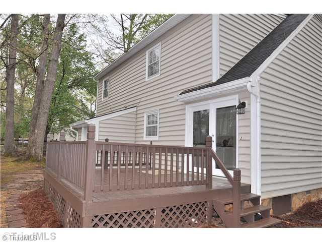 7261 Strawberry Road Summerfield, NC 27358 - Photo 11 of 13 Exterior Back. Enjoy a warm spring evening on your back deck grilling or just hanging out.