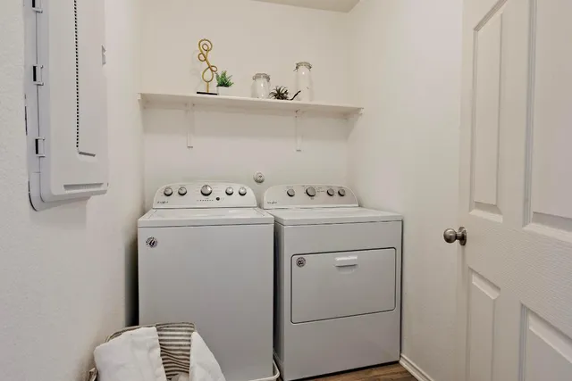 a utility room with dryer and washer