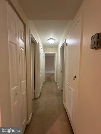 a bathroom with a toilet sink and a mirror