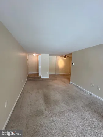 an empty room with window