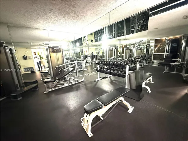 a gym room with gym equipment