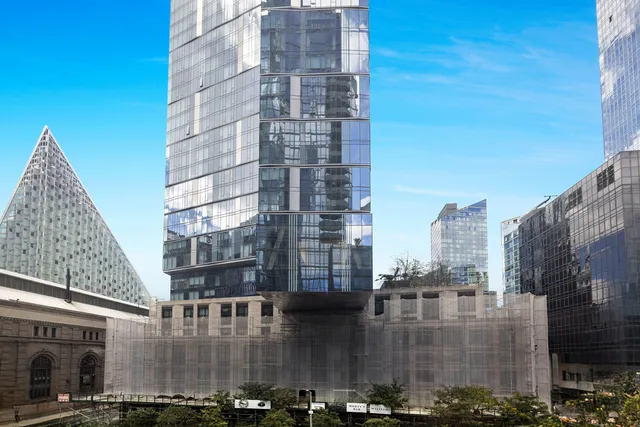 a kitchen with a sink and a stove top oven