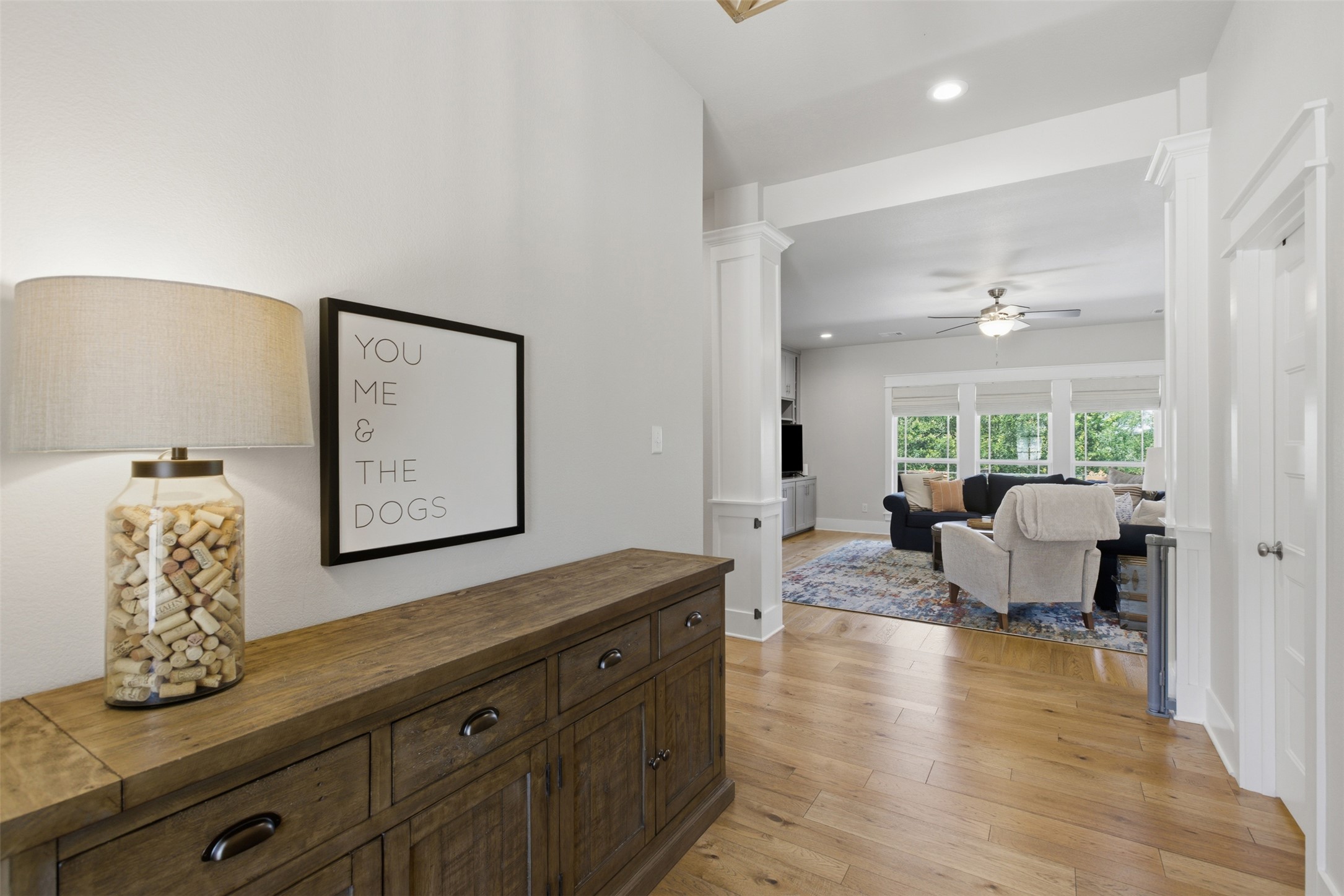 1804 Tanner Loop Taylor, TX 76574 - Photo 20 of 40 The foyer welcomes you with engineered wood flooring that runs through all main areas.