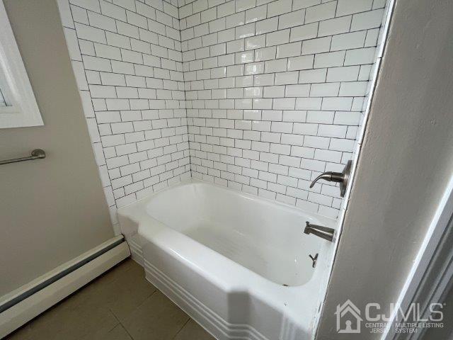 57 Corey Street Fords, NJ 08863 - Photo 11 of 18 a bathroom with a bathtub