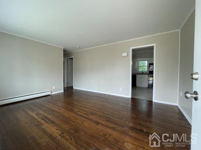 57 Corey Street Fords, NJ 08863 - Photo 3 of 18 an empty room with wooden floor and windows