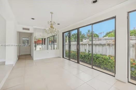 4144 Alton Road Miami Beach, FL 33140 - Photo 13 of 49 a view of a room with windows