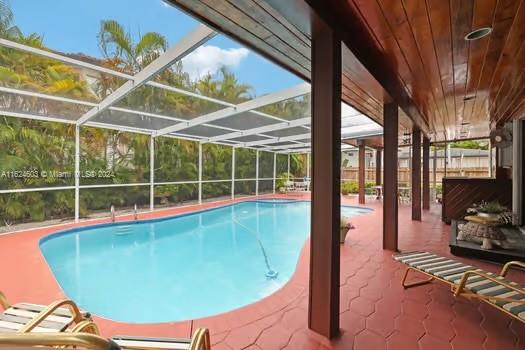 4144 Alton Road Miami Beach, FL 33140 - Photo 31 of 49 a view of a swimming pool