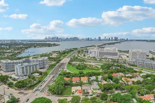 4144 Alton Road Miami Beach, FL 33140 - Photo 43 of 49 a view of a city and a lake