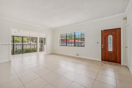 4144 Alton Road Miami Beach, FL 33140 - Photo 6 of 49 an empty room with windows