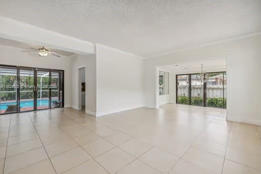 4144 Alton Road Miami Beach, FL 33140 - Photo 7 of 49 a view of an empty room with glass door