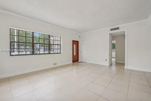 4144 Alton Road Miami Beach, FL 33140 - Photo 8 of 49 an empty room with windows