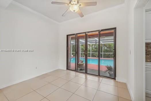 4144 Alton Road Miami Beach, FL 33140 - Photo 10 of 49 a view of an empty room with a window