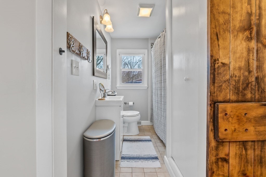 4 Claire Road Amesbury, MA 01913 - Photo 16 of 26 a bathroom with a toilet and a shower