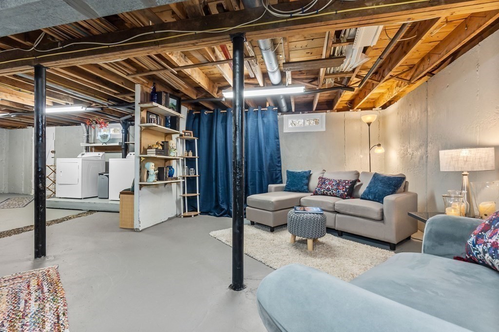 4 Claire Road Amesbury, MA 01913 - Photo 19 of 26 a living room with furniture and white walls