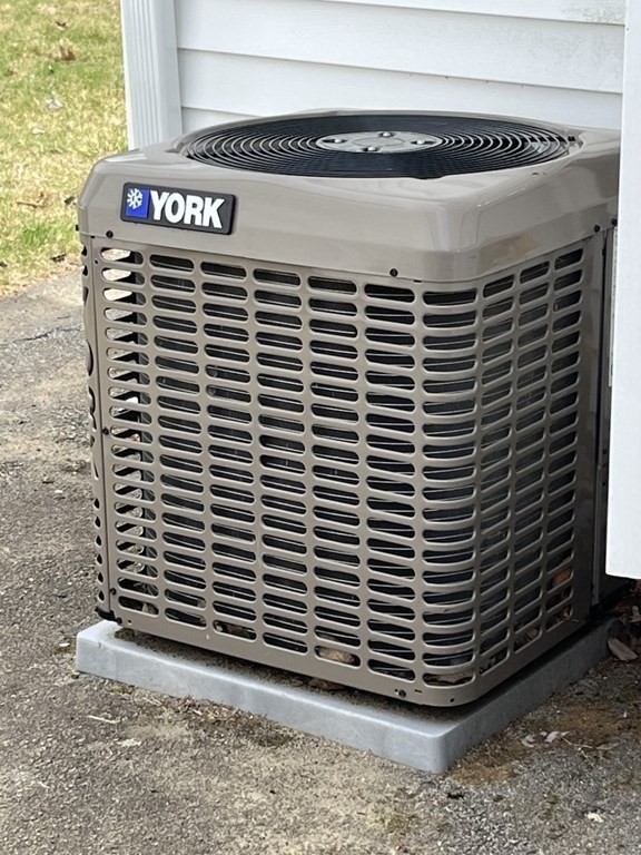 4 Claire Road Amesbury, MA 01913 - Photo 22 of 26 a front view of a building with entryway
