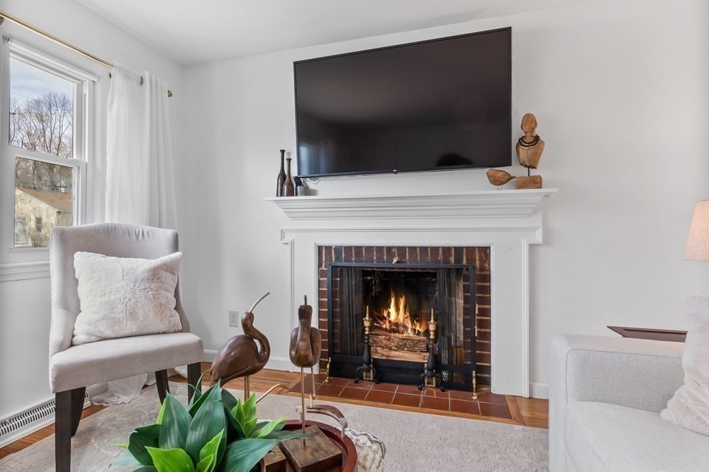 4 Claire Road Amesbury, MA 01913 - Photo 6 of 26 a living room with furniture and a fireplace