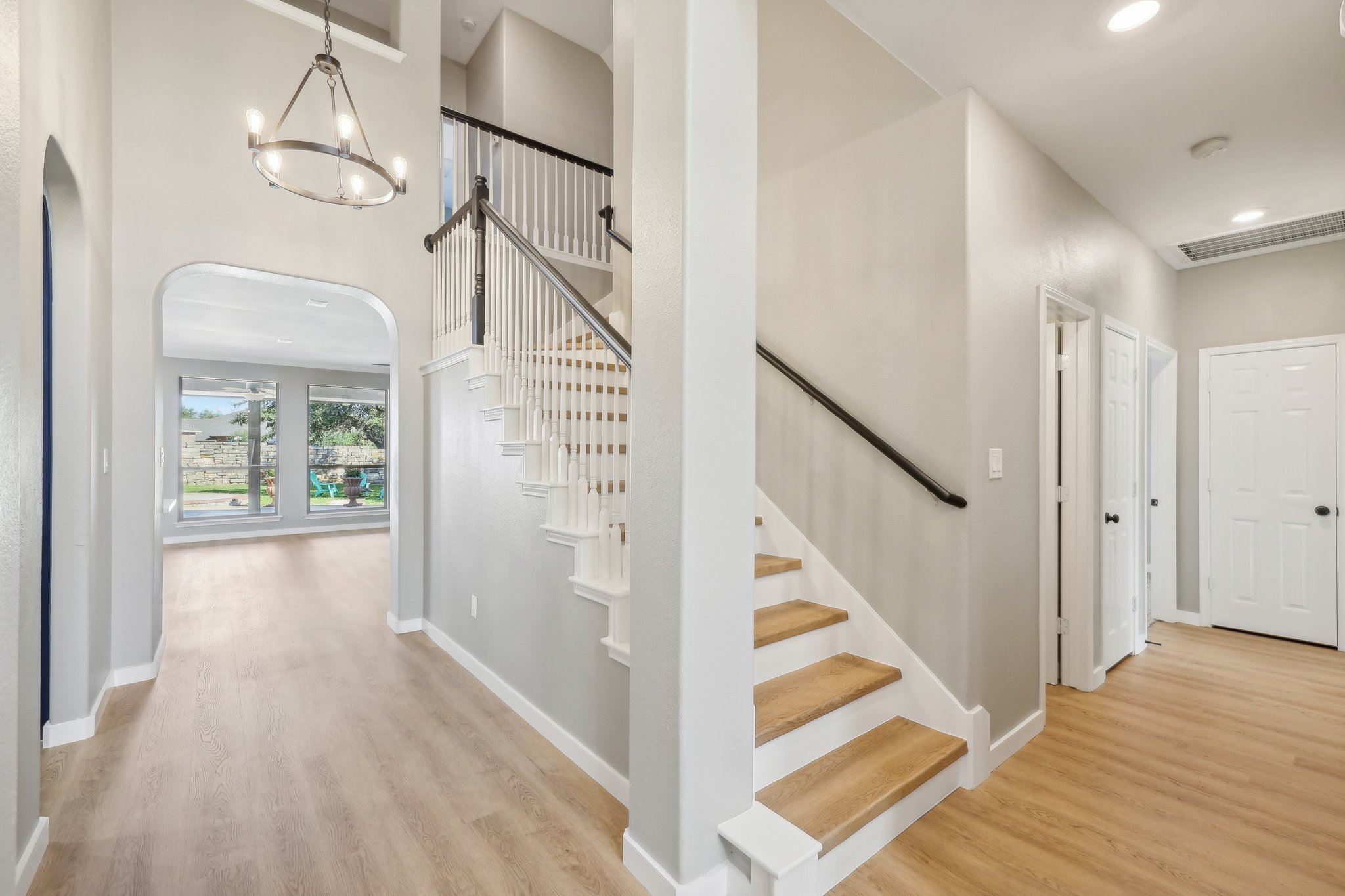 7324 Moon Rock Road Austin, TX 78739 - Photo 4 of 30 a view of entryway and hall with wooden floor